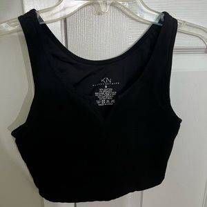 Lightly worn crop top. V cut out and no padding